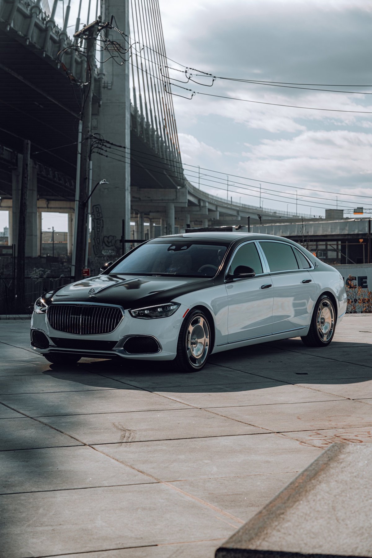 White luxury Maybach sedan front angle view