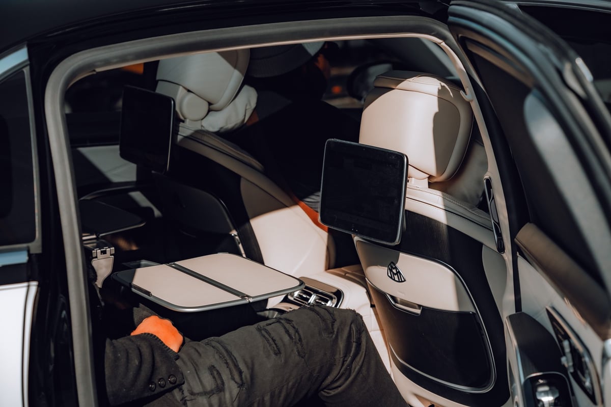 Luxury Maybach interior with white leather seats
